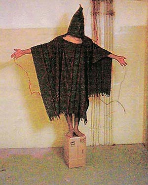 US forces torturing a "terrorist" at Abu Ghraib in Iraq
