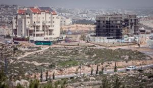 West Bank settlement on Palestinian land Source: Haaretz.com